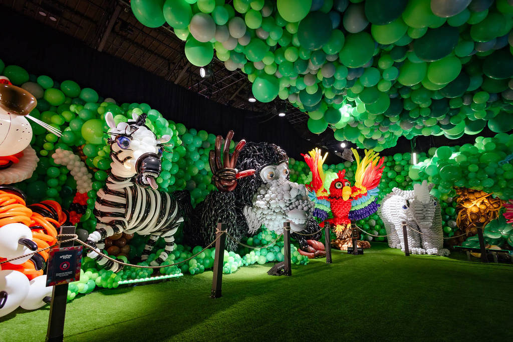Balloon Story exhibition installation with animal balloon sculptures