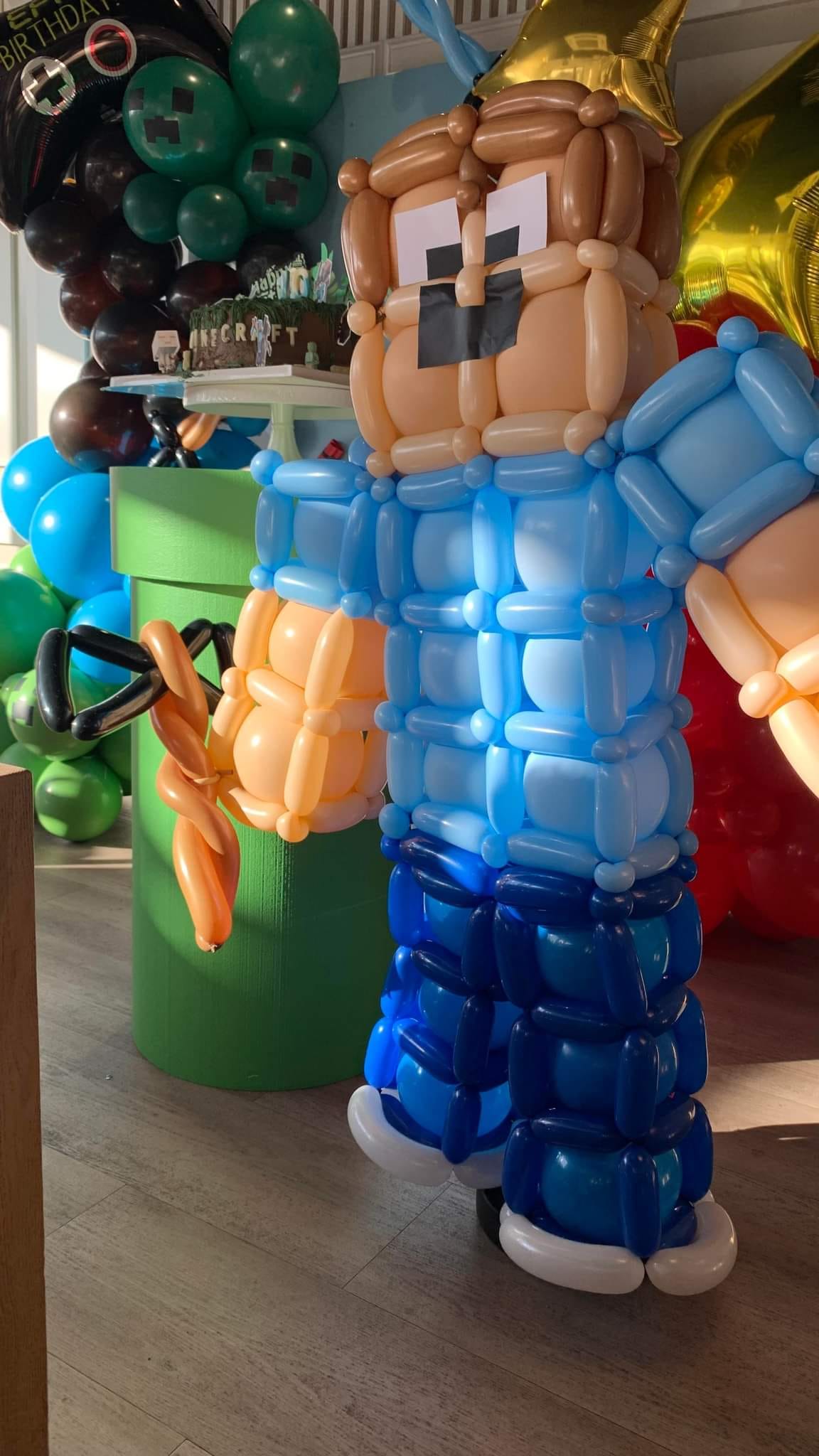 Life-sized Minecraft balloon art for a bold birthday display